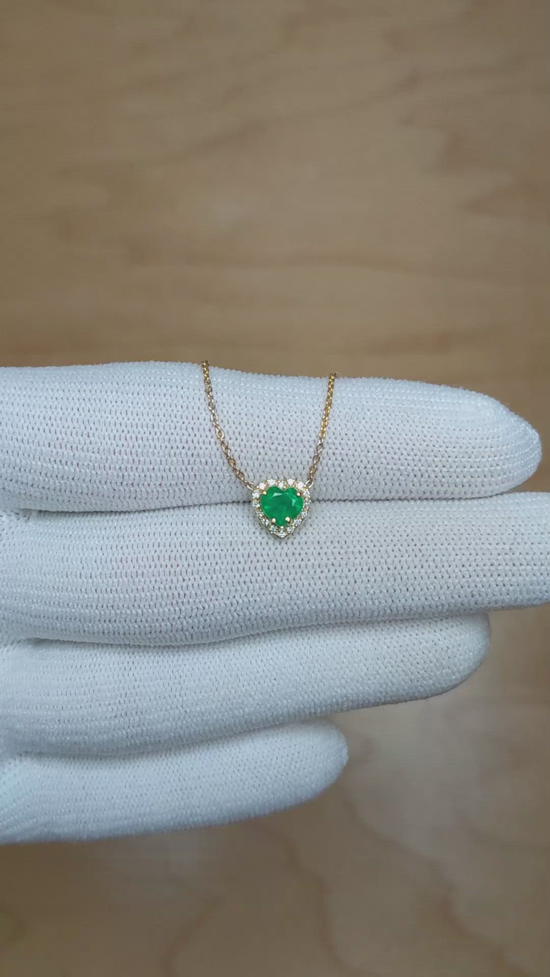0.47 Ct. Emerald and Natural Diamond Halo Necklace, 14K Yellow Gold Size Video