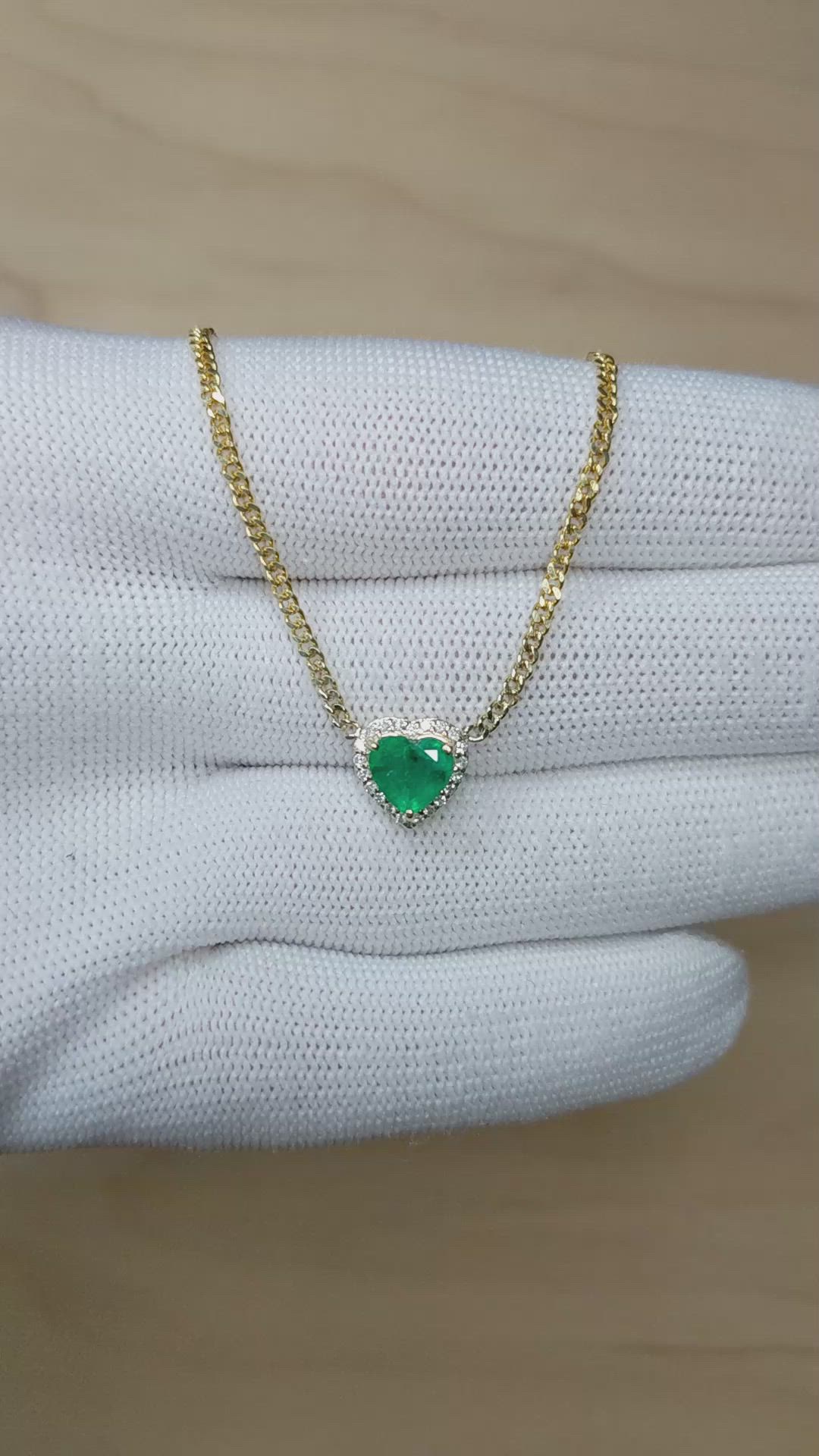 1.02 Ct. Emerald and Natural Diamond Halo Necklace, 14K Yellow Gold Size Video