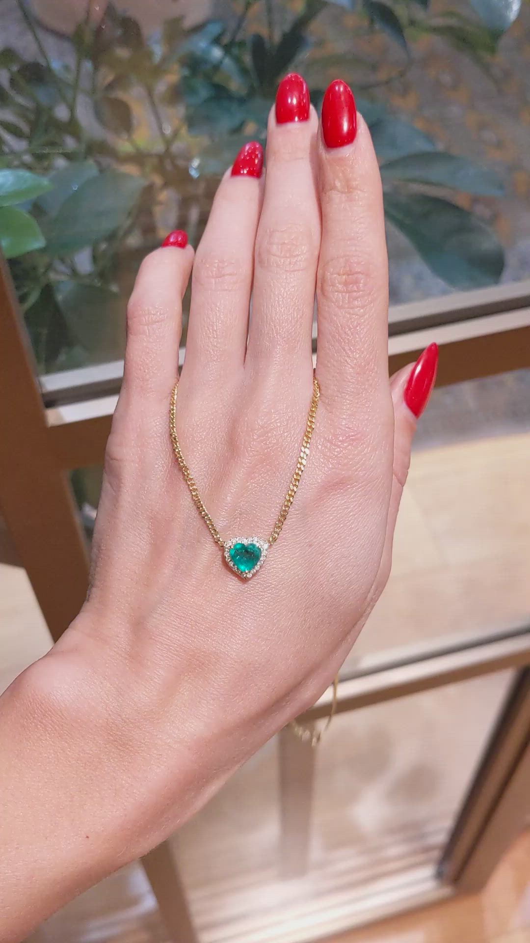 1.02 Ct. Emerald and Natural Diamond Halo Necklace, 14K Yellow Gold Size Video