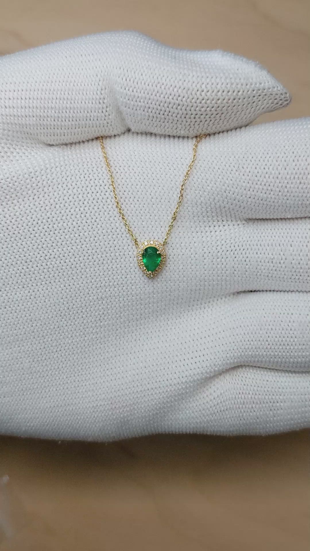 0.36 Ct. Emerald and Natural Diamond Halo Necklace, 18K Yellow Gold Size Video