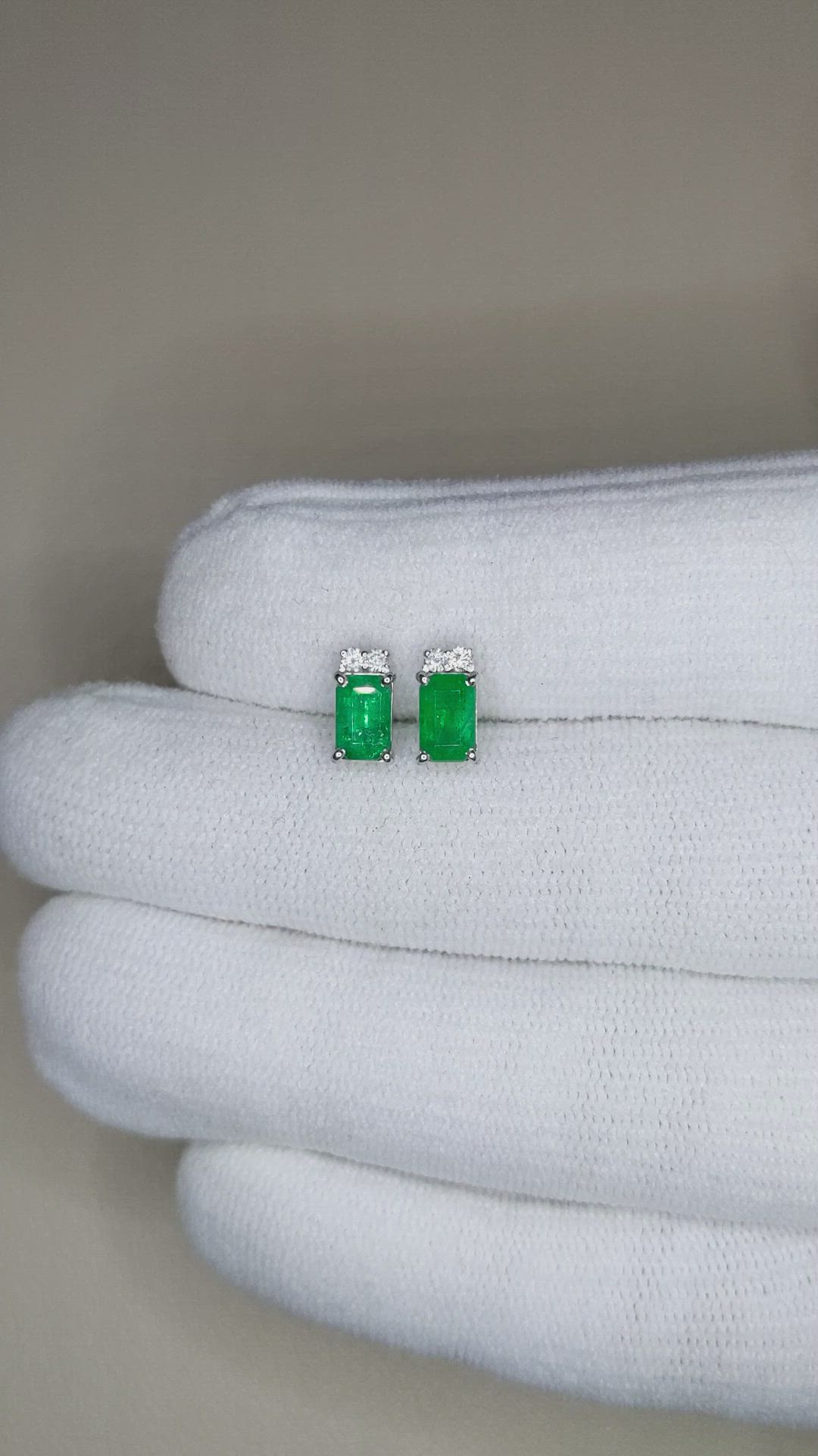 0.88&nbsp;Ct.Tw.Total Carat Weight Emerald and Natural Diamond Studs Earrings, 18K White Gold Size Video