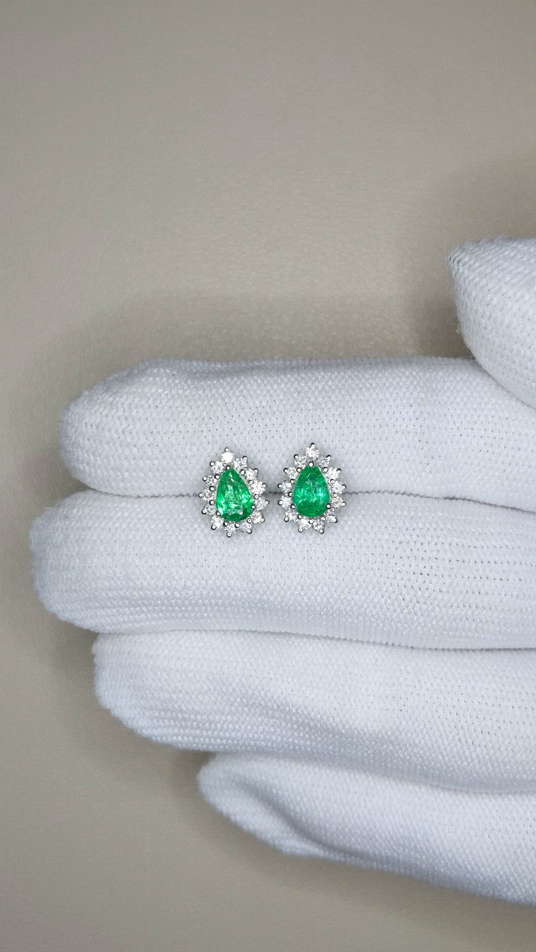 0.76 Ct.Tw.Total Carat Weight Emerald and Natural Diamond Studs Earrings, 14K White Gold Size Video