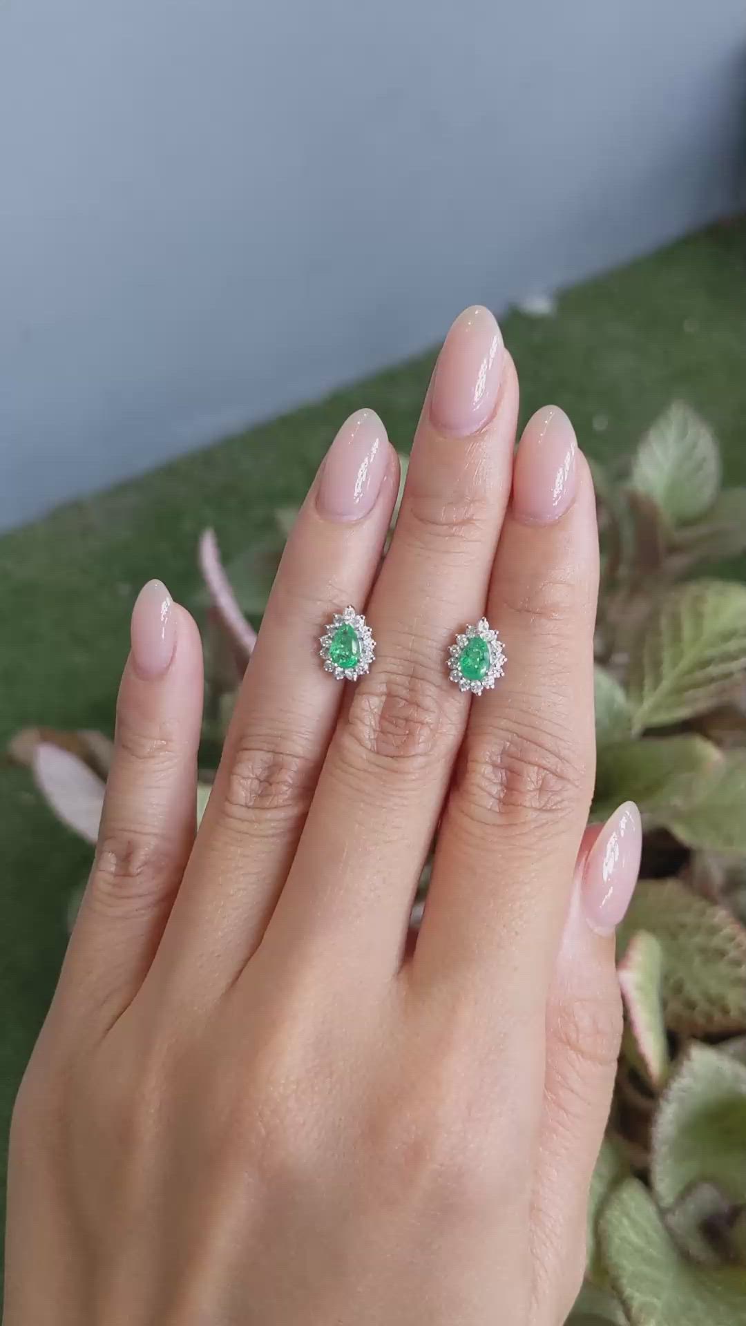 0.76 Ct.Tw.Total Carat Weight Emerald and Natural Diamond Studs Earrings, 14K White Gold Size Video