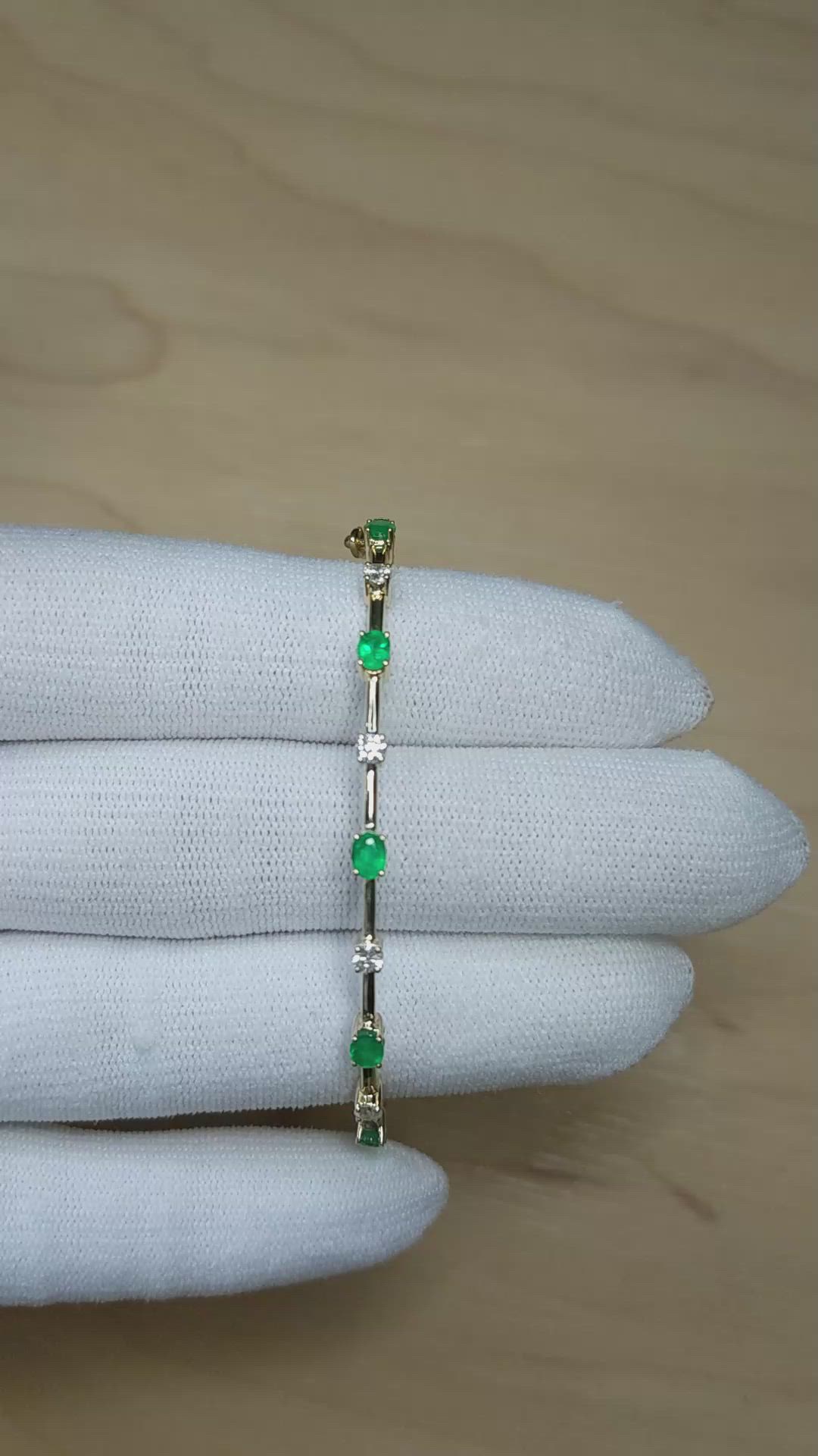 0.87&nbsp;Ct.Tw.Total Carat Weight Emerald and Natural Diamond Bangle Bracelet, 14K Yellow Gold Size Video