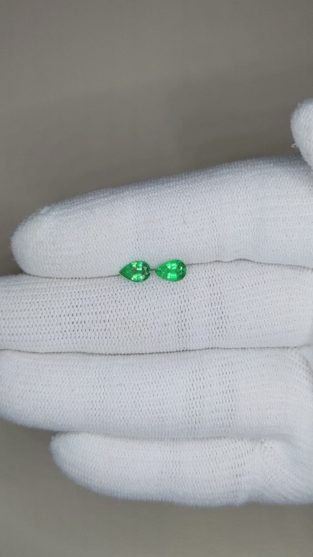 0.69 Ct.Tw.Total Carat Weight Emerald Pair from Zambia Size Video
