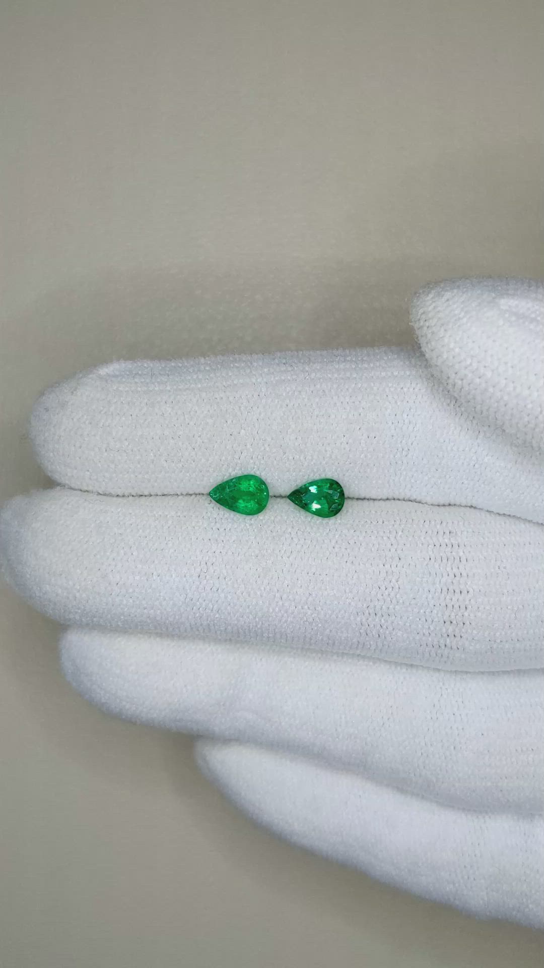 0.69 Ct.Tw.Total Carat Weight Emerald Pair from Zambia Size Video